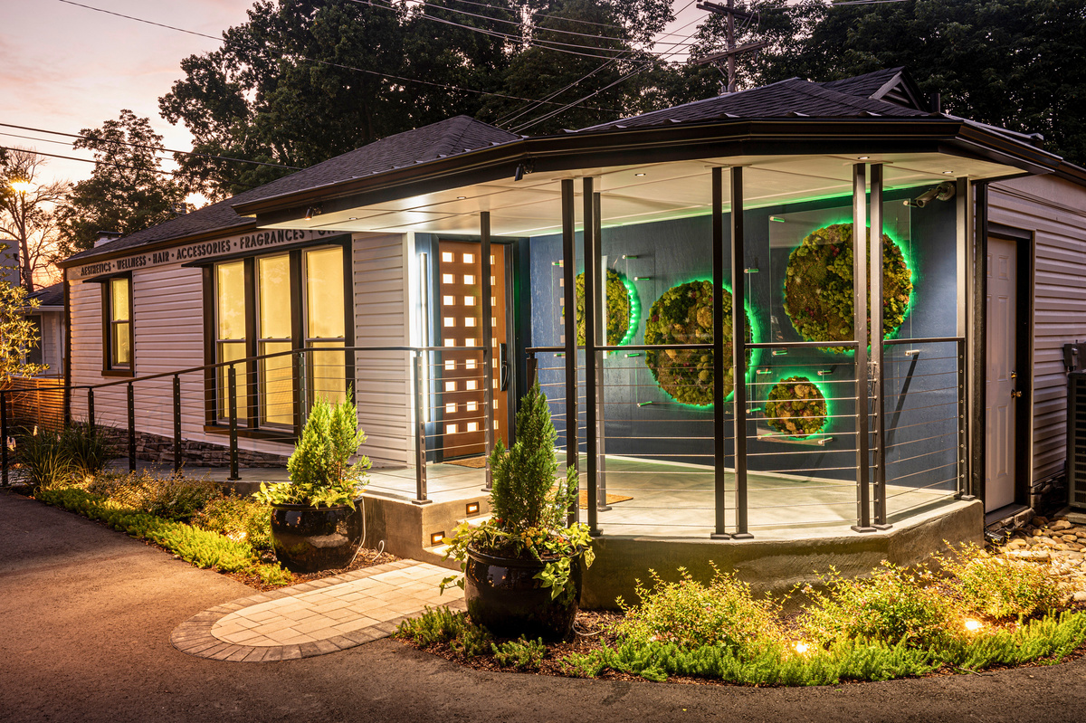 Covered porch and landscaped entry at 606 W Iris Drive